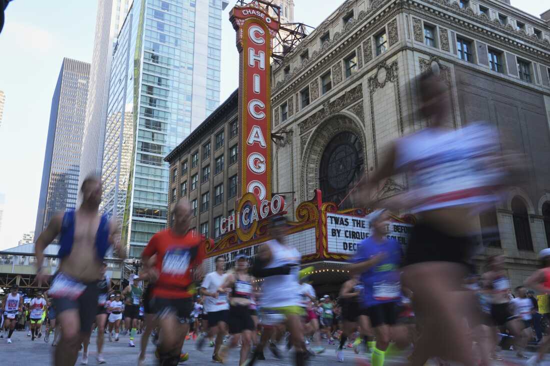 Runners participate in the Chicago Marathon on Sunday. Nam Y. Huh/AP